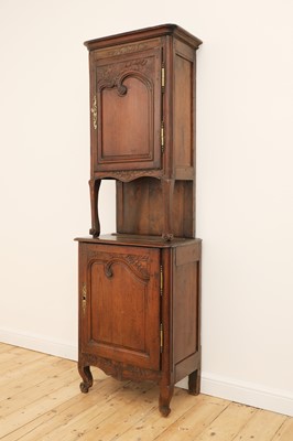 Lot 401 - A French provincial pine and walnut cupboard