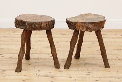 Lot 701 - A pair of rustic tree slice occasional tables