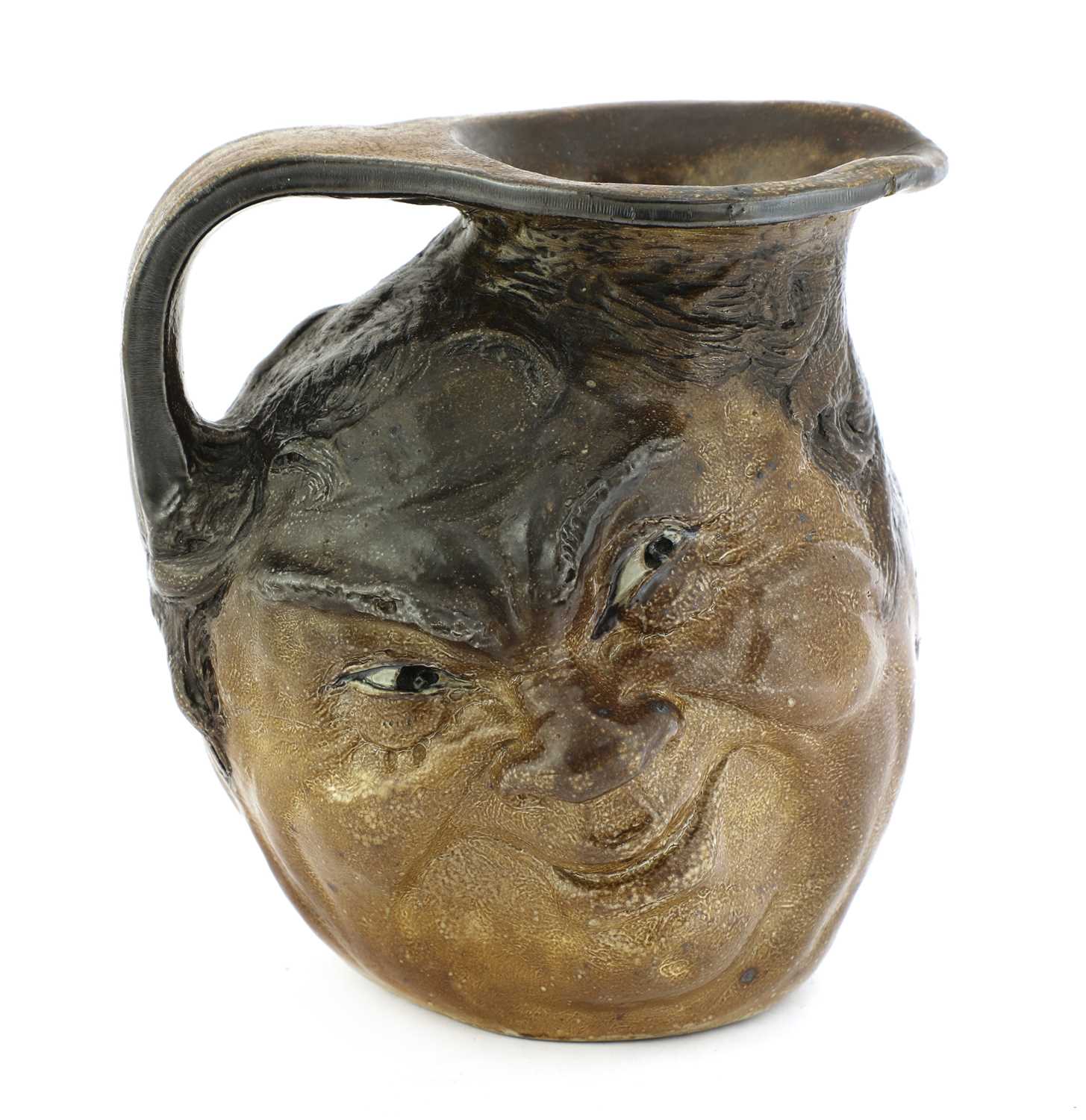 Lot 180 - A Martin Brothers stoneware double face jug