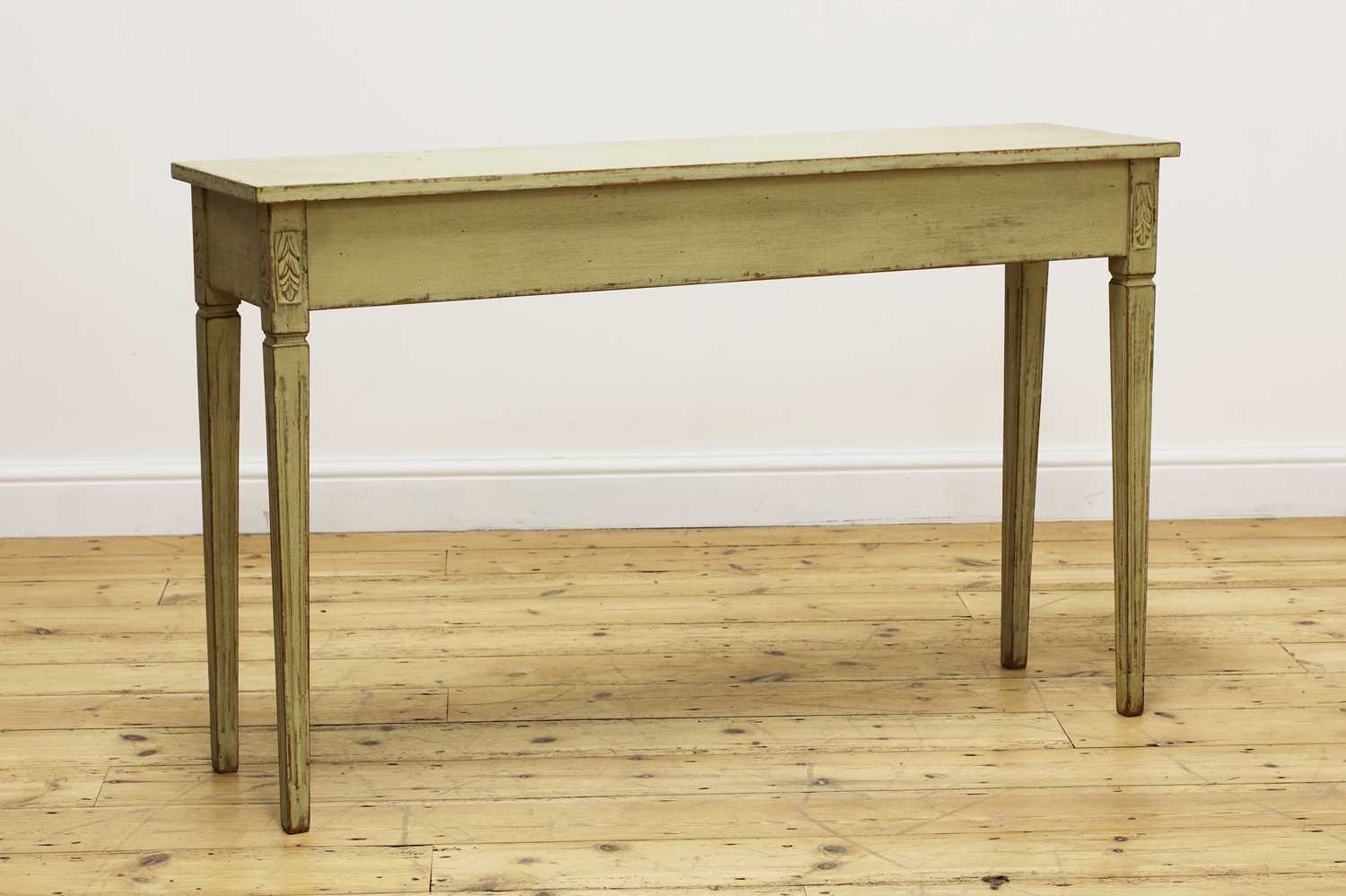 Lot 201 - A painted console table in the Continental taste