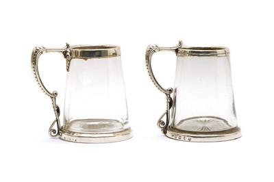 Lot 3 - A pair of Victorian silver mounted glass tankards
