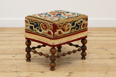 Lot 18 - A walnut stool in the manner of A W N Pugin