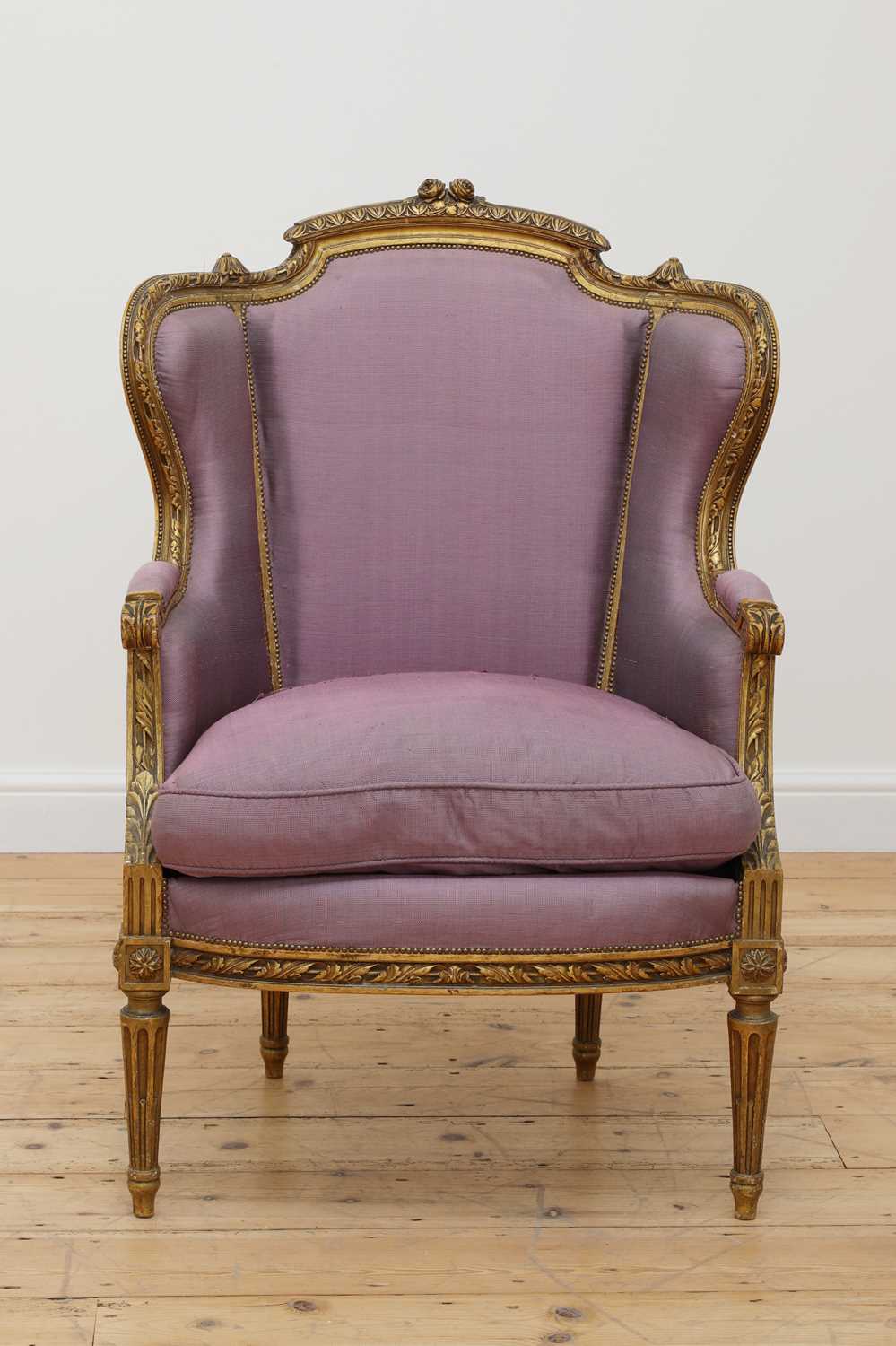 Lot 147 - A Louis XVI-style giltwood fauteuil