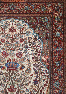Lot 237 - A Persian silk carpet