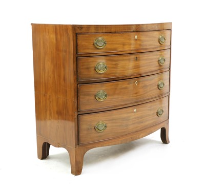 Lot 407 - A George III mahogany crossbanded bowfronted chest of four graduated drawers