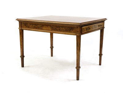 Lot 415 - An early 20th century figured walnut writing table