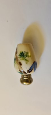 Lot 75 - A collection of ceramic scent bottles