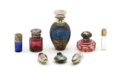 Lot 72 - A collection of glass scent bottles