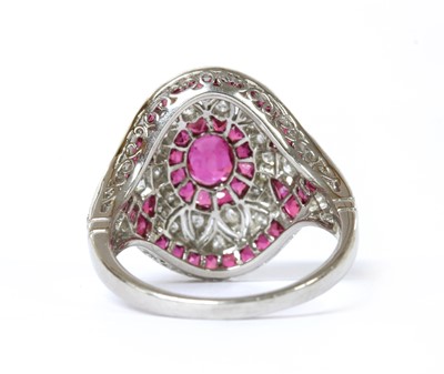 Lot 1155 - A platinum ruby and diamond ring