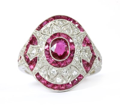 Lot 1155 - A platinum ruby and diamond ring