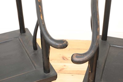 Lot 469 - A pair of Chinese style ebonised softwood armchairs