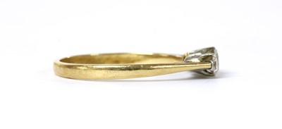 Lot 1098 - A gold three stone diamond ring
