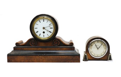 Lot 235 - An Art Deco oak mantel clock