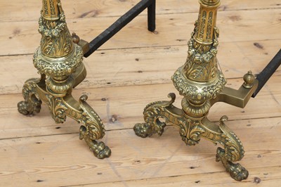 Lot 85 - A pair of neoclassical brass firedogs