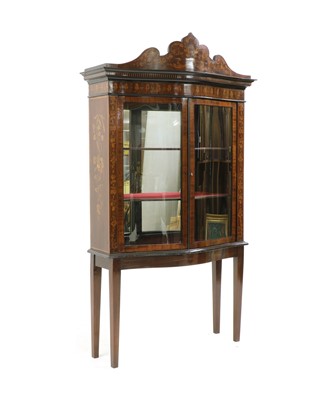 Lot 409 - An Edwardian mahogany inlaid display cabinet
