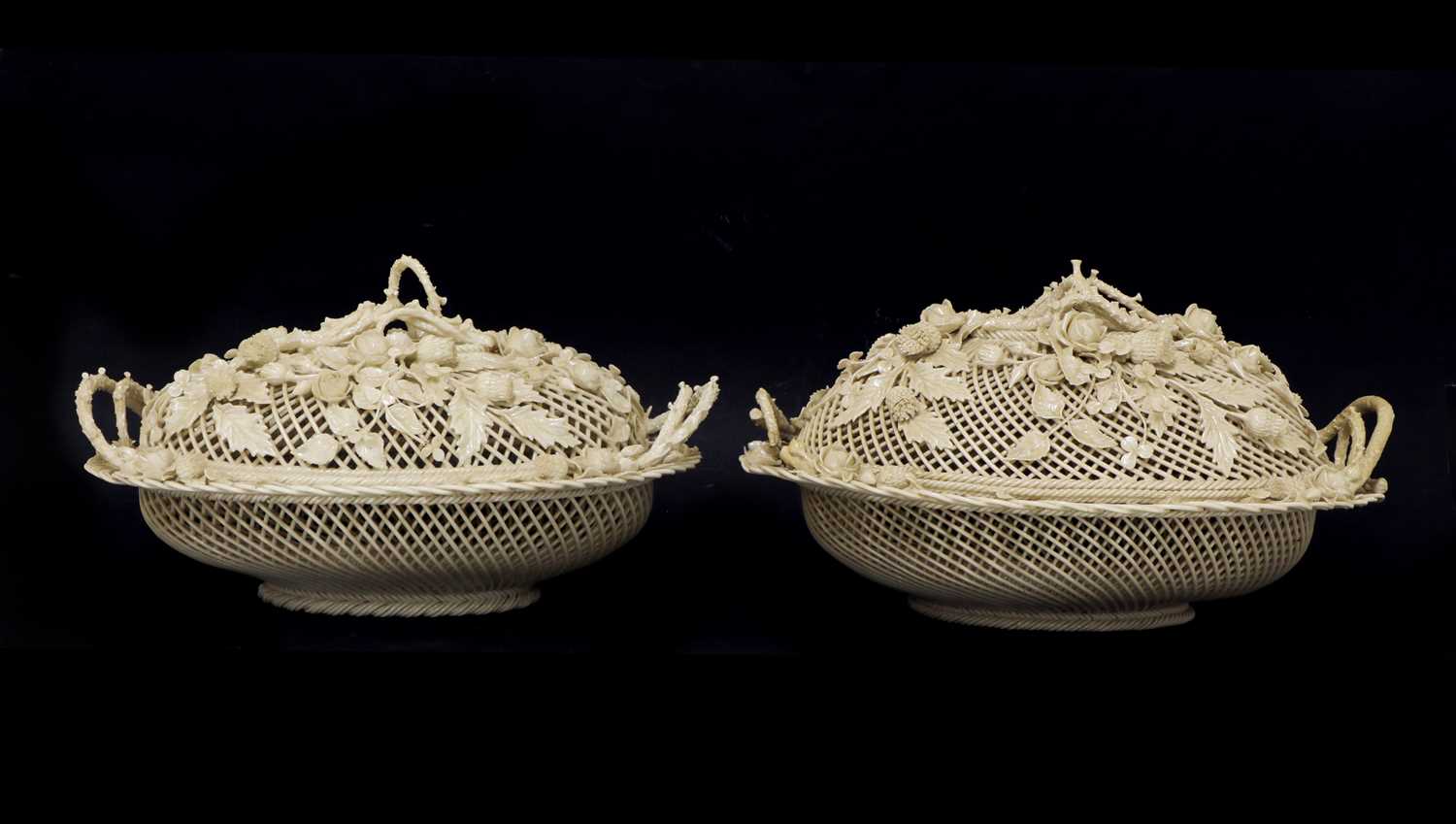 Lot 212 - A pair of Belleek-type porcelain baskets and covers