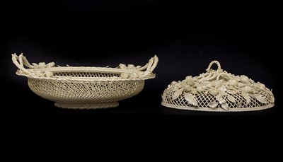 Lot 212 - A pair of Belleek-type porcelain baskets and covers
