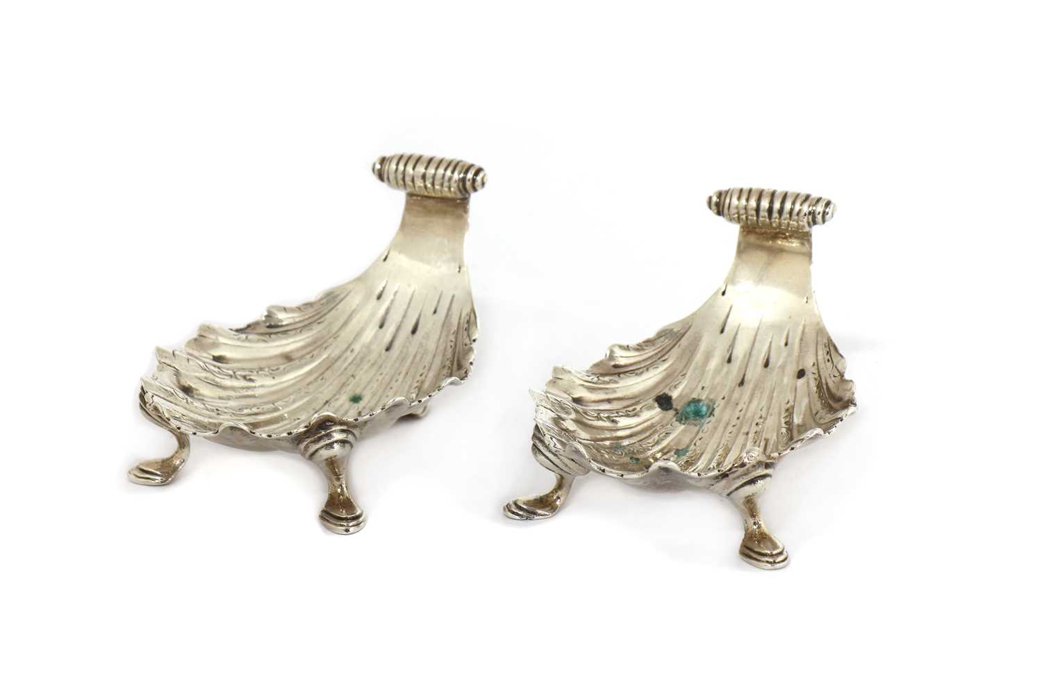 Lot 192 - A pair of cast white metal shell butter dishes