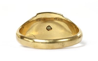 Lot 1283 - A 9ct gold diamond set signet ring