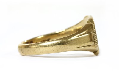 Lot 1283 - A 9ct gold diamond set signet ring