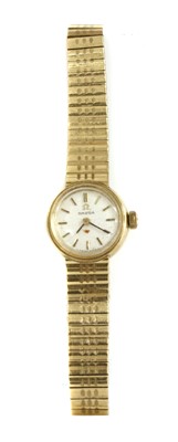 Lot 1322 - A ladies' 9ct gold Omega mechanical bracelet watch