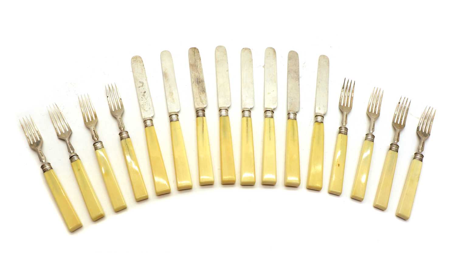 Lot 42 - A set of eight Victorian silver and ivorine fruit knives and forks
