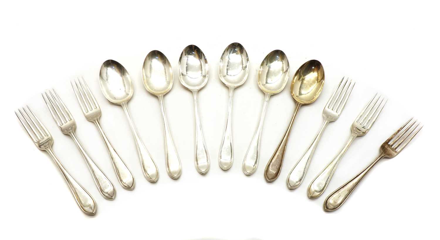 Lot 21 - A set of six silver forks