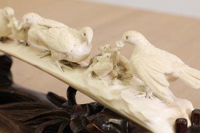 Lot 180 - A Japanese carved ivory dove bridge group
