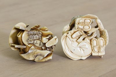 Lot 167 - Two small Japanese carved ivory okimonos
