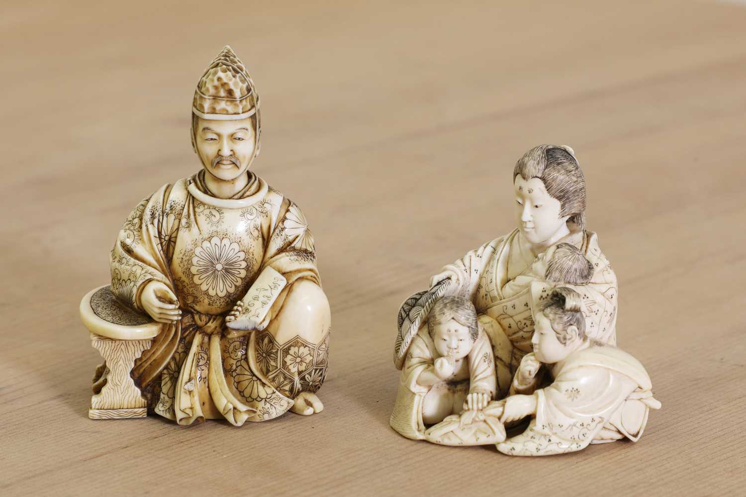 Lot 167 - Two small Japanese carved ivory okimonos
