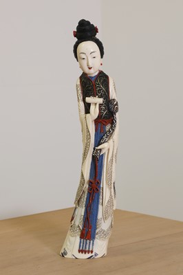 Lot 164 - A Chinese carved ivory 'long' lady