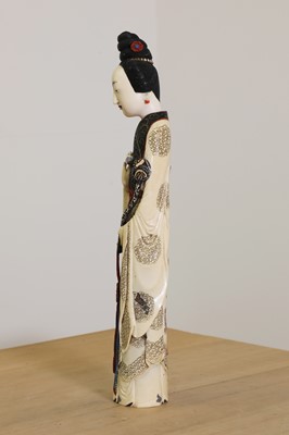Lot 164 - A Chinese carved ivory 'long' lady