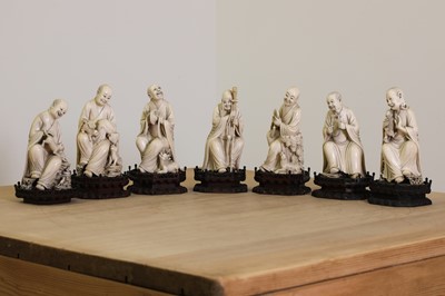 Lot 153 - A set of eighteen Chinese carved ivory figures