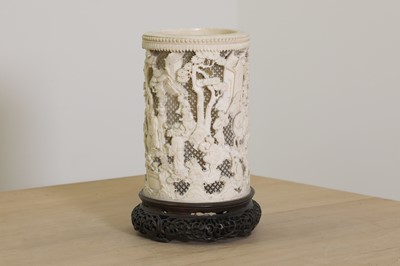 Lot 152 - A Chinese carved ivory brush pot