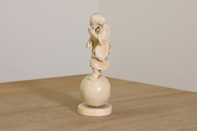 Lot 158 - A Japanese carved ivory figure of a child