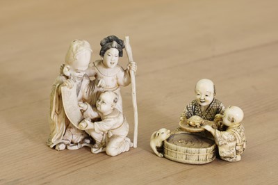Lot 157 - Two small Japanese carved ivory groups