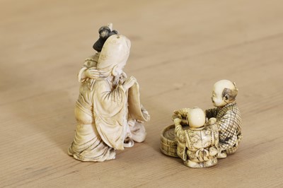 Lot 157 - Two small Japanese carved ivory groups