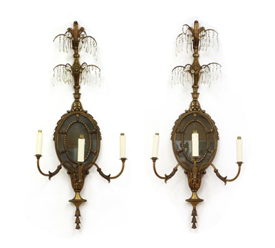 Lot 228 - A pair of French-style neoclassical gilt metal three-branch wall lights