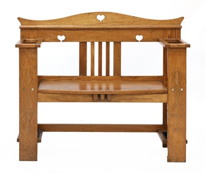 Lot 157 - An Arts and Crafts oak hall seat