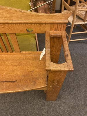 Lot 157 - An Arts and Crafts oak hall seat