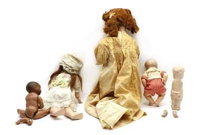 Lot 51 - A collection of porcelain headed dolls