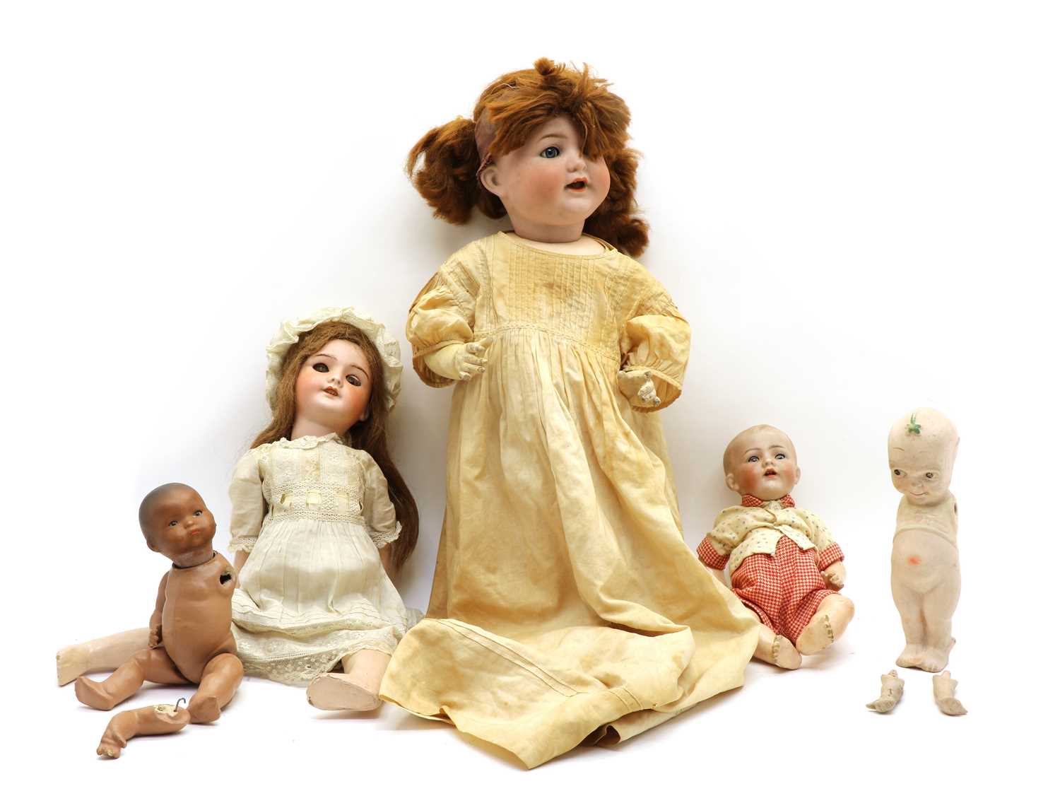 Lot 51 - A collection of porcelain headed dolls