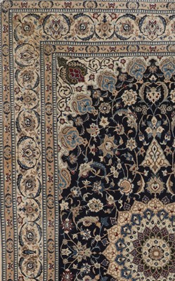 Lot 286 - A Persian wool and silk rug