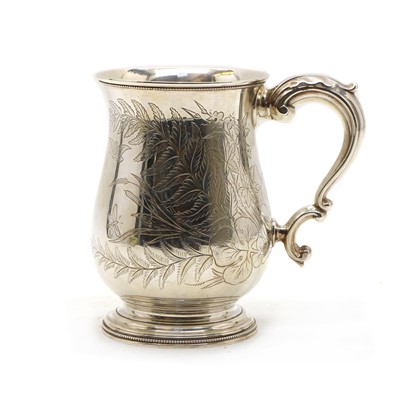 Lot 2 - A Victorian silver baluster form mug