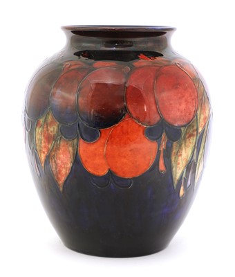 Lot 438 - A large William Moorcroft flambé-glazed 'Wisteria' vase