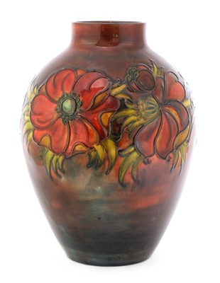 Lot 437 - A Walter Moorcroft flambé-glazed 'Anemone' pattern vase