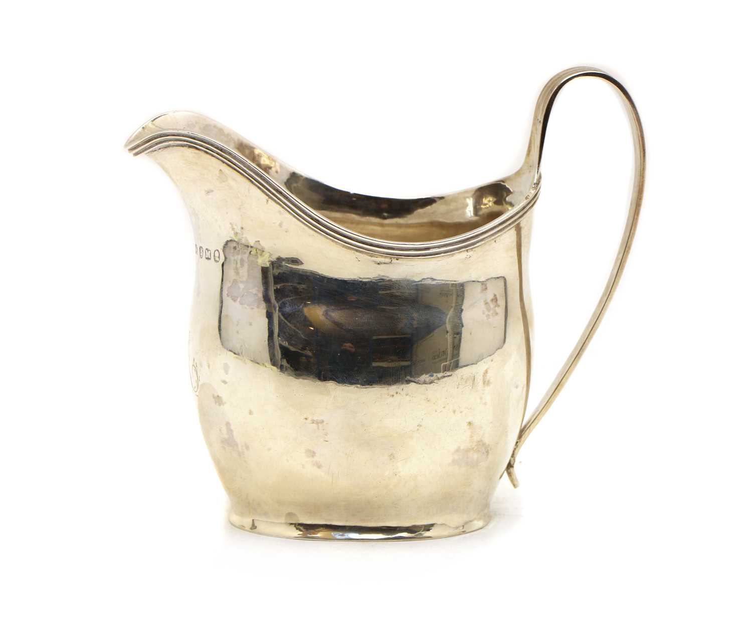 Lot 6 - A Georgian silver cream jug