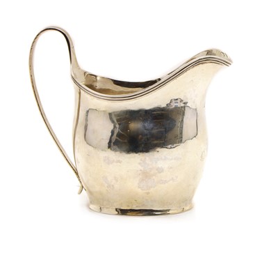 Lot 6 - A Georgian silver cream jug