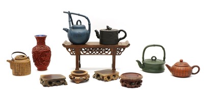 Lot 176 - A collection of seven Chinese Yixing zisha, teapots