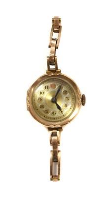 Lot 1325 - A ladies' 9ct gold mechanical bracelet watch